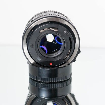 Canon 50mm f/1.8 w/ 1984 Olympic Cap